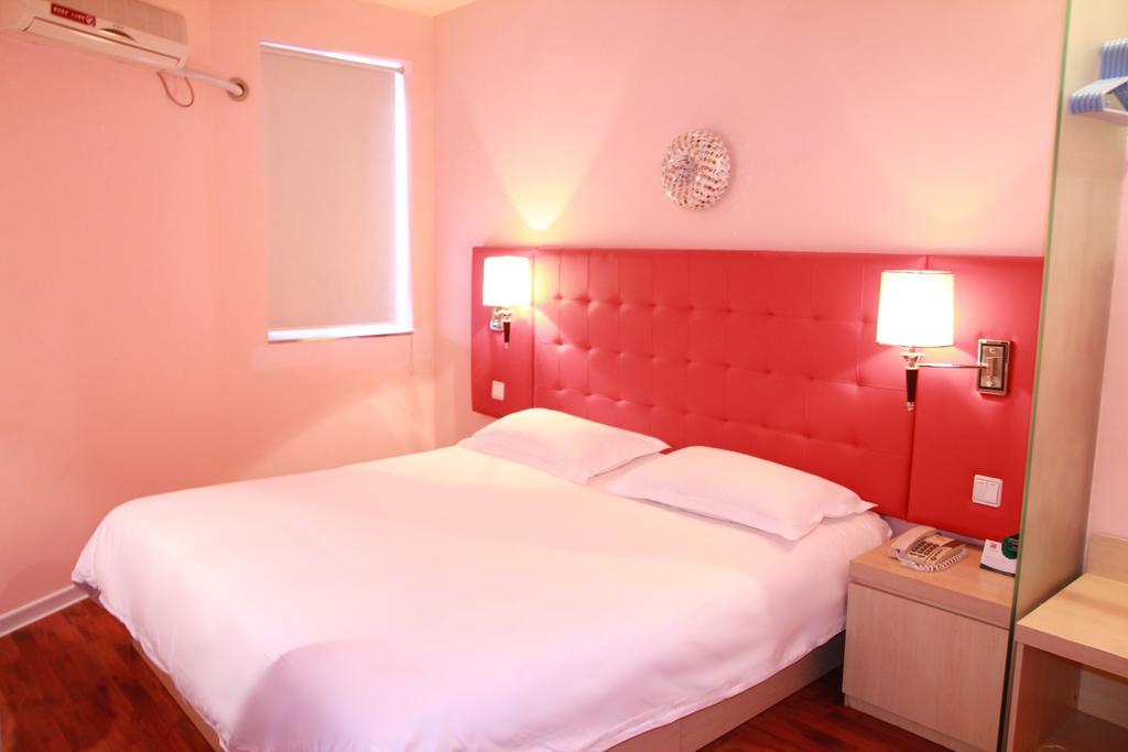 Qingdao Renjia Bussiness Hotel Номер фото