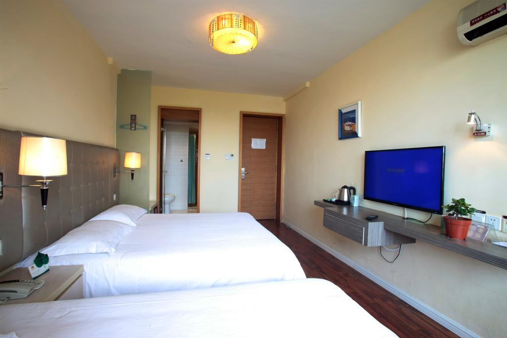 Qingdao Renjia Bussiness Hotel Екстер'єр фото