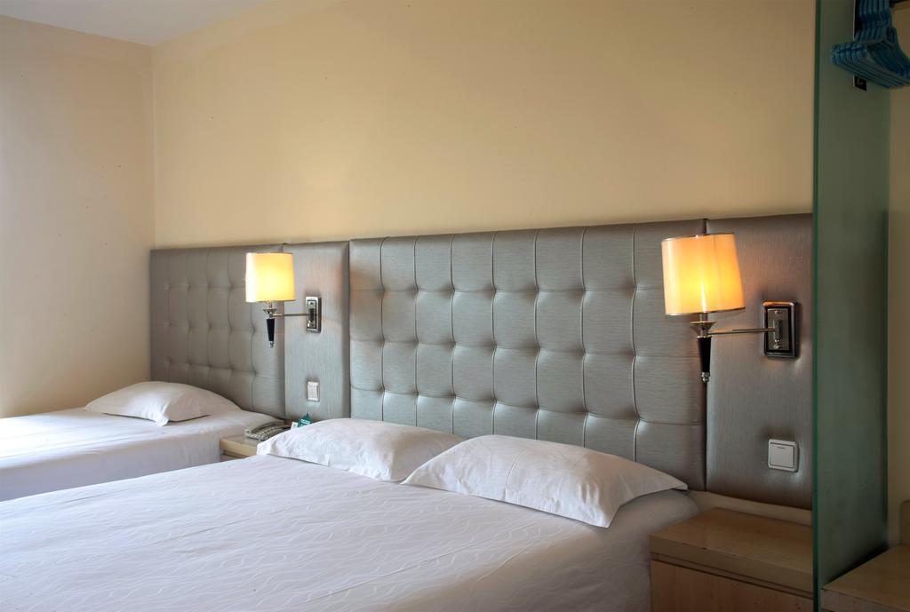 Qingdao Renjia Bussiness Hotel Екстер'єр фото