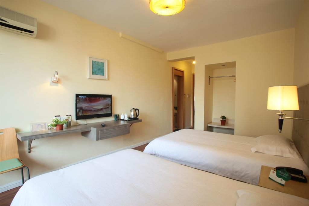 Qingdao Renjia Bussiness Hotel Екстер'єр фото