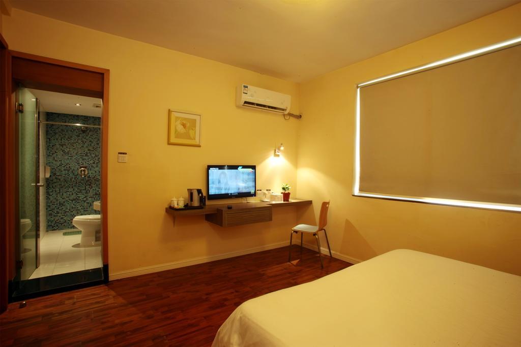 Qingdao Renjia Bussiness Hotel Екстер'єр фото