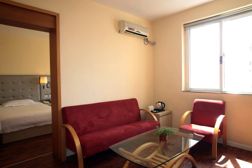 Qingdao Renjia Bussiness Hotel Екстер'єр фото